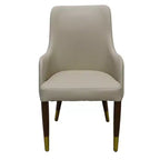 Fauteuil de salle à manger en cuir avec pieds en bois à accents dorés pour cuisine et intérieur modernes
