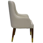 Fauteuil de salle à manger en cuir avec pieds en bois à accents dorés pour cuisine et intérieur modernes